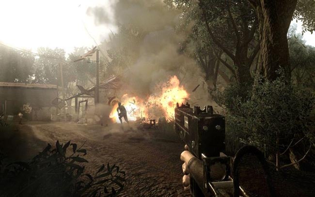 First-person view of a fiery explosion in Far Cry 2 game.