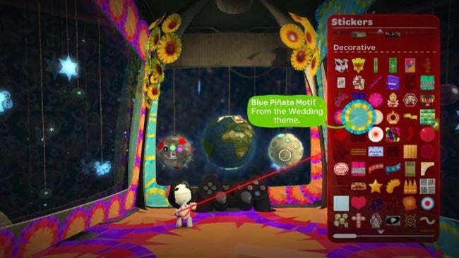 Screenshot of LittleBigPlanet game showing sticker selection menu.