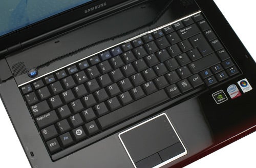 Close-up of Samsung R560 notebook keyboard and touchpad.