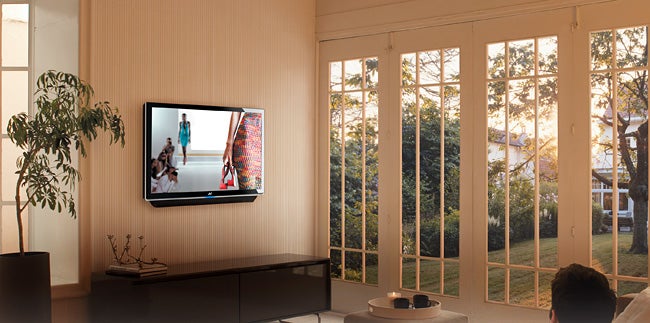 JVC 47-inch LCD TV mounted in bright living room.