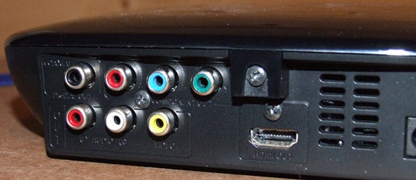 Close-up of Samsung DVD-F1080 player's rear connectivity ports.