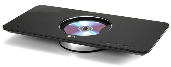 LG DVS450H DVD player with disc inserted.