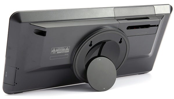 LG DVS450H DVD Player on its side showing disc slot and controls.