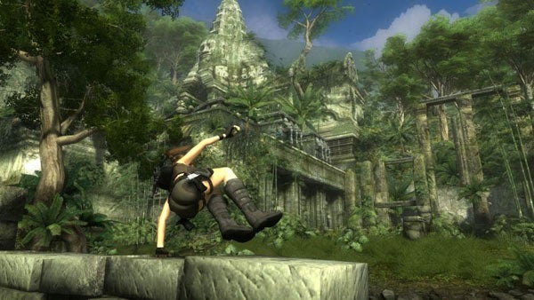 Lara Croft jumping across ruins in Tomb Raider: Underworld game.