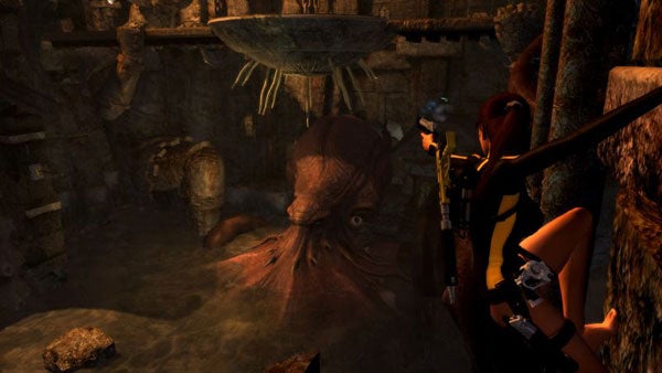 Screenshot from Tomb Raider: Underworld game showing character and large octopus.