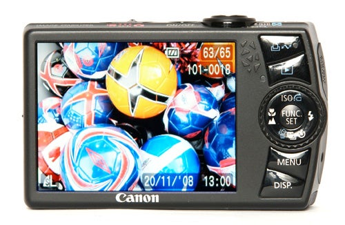 Canon IXUS 870 IS camera with colorful helmet display on screen.