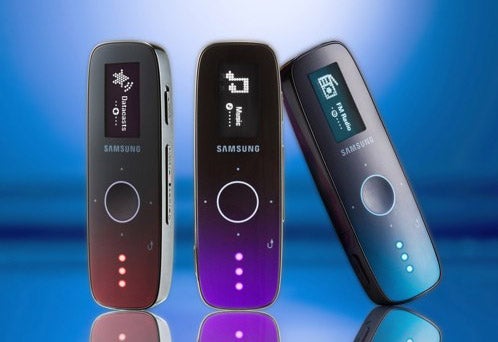 Three Samsung YP-U4 MP3 players with illuminated controls.