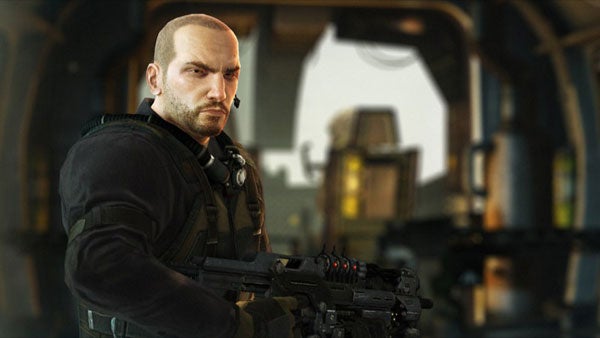 Determined soldier holding a gun in a futuristic setting.