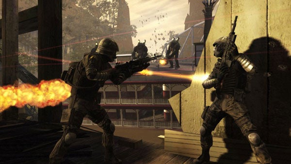 Screenshot of Resistance 2 gameplay showing soldiers in combat.