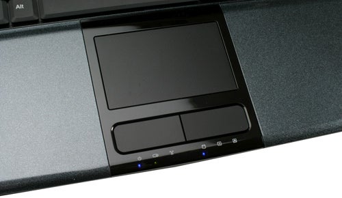 Close-up of Novatech X50MV Pro Gaming Notebook touchpad and status indicators.