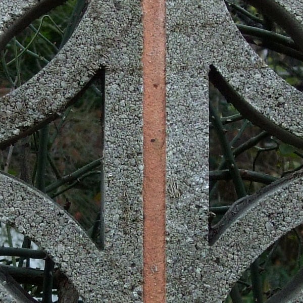 Close-up of intricate metalwork with fine textures.