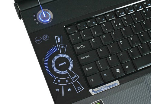 Acer Aspire 6935G laptop keyboard and media control interface.