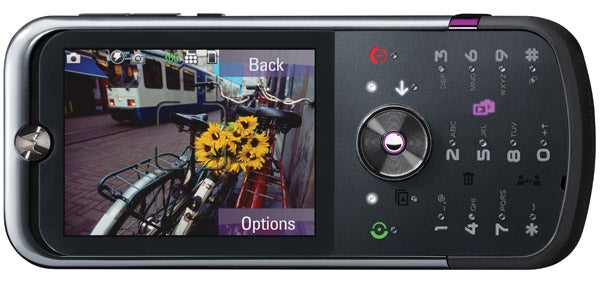 Motorola MOTOZINE ZN5 phone displaying camera interface with photo.