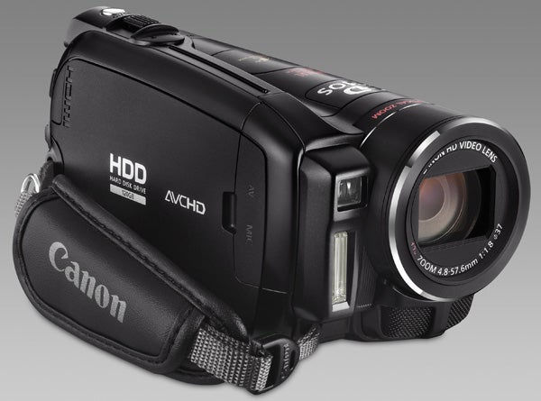 Canon HG21 camcorder on a gray background.