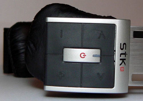 Close-up of Santok STK BTHS600 Bluetooth Headset controls.