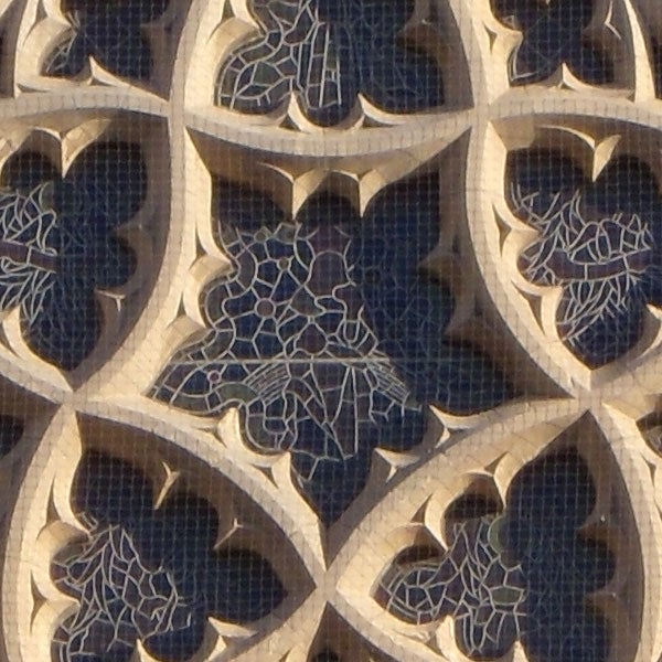 Detailed stone carving patterns on a facade.