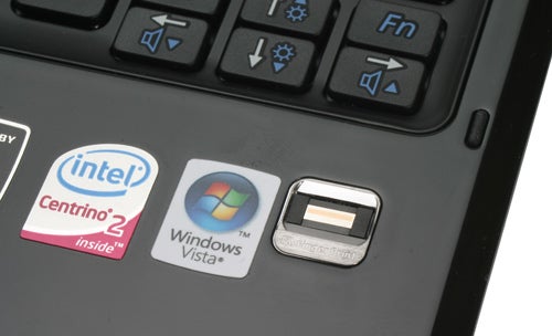 Close-up of Samsung X460 notebook keyboard with Intel and Windows stickers.