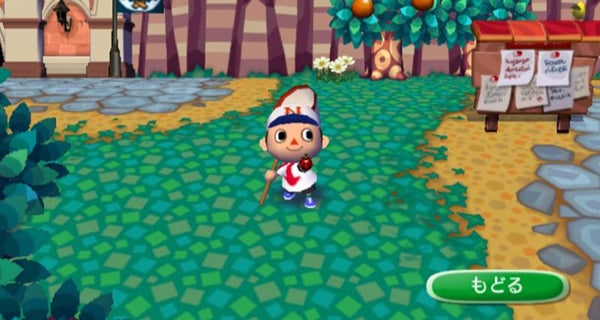 Screenshot from Animal Crossing game showing a character holding a lollipop.
