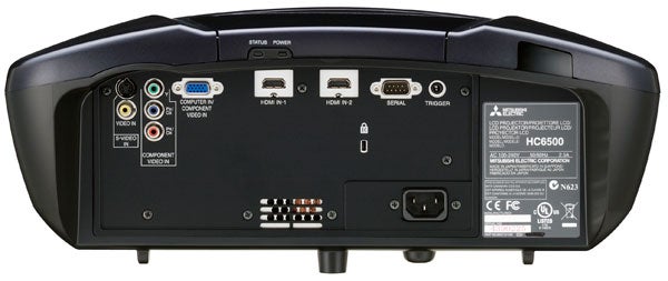 Rear panel of Mitsubishi HC6500 LCD Projector showing ports and labels.