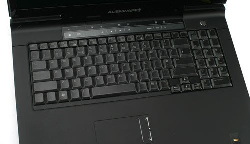 Close-up of Alienware M17 gaming laptop keyboard and touchpad.