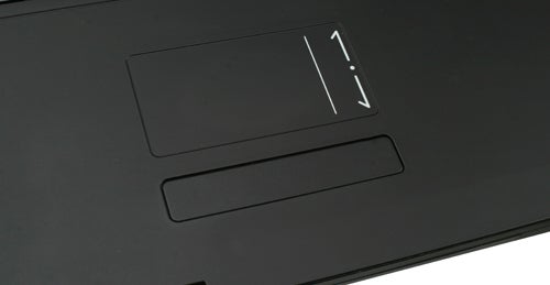 Close-up of Alienware M17 gaming laptop trackpad and palm rest.