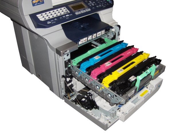 Brother MFC-9840CDW printer with open toner compartment.