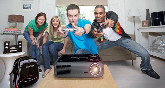 Friends playing video games with Optoma GT7000 projector.
