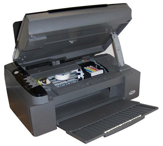Epson Stylus SX100 printer with open scanner lid.