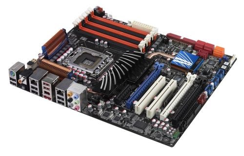 Asus P6T Deluxe motherboard with heatsinks and expansion slots.
