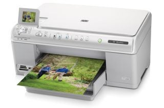 HP Photosmart C6380 printer with photo printout.