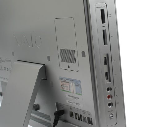 Close-up of Sony VGC-JS1E PC rear ports and stand.