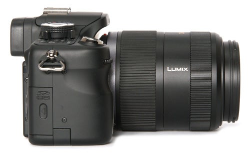 Panasonic Lumix DMC-G1 camera with telephoto lens.