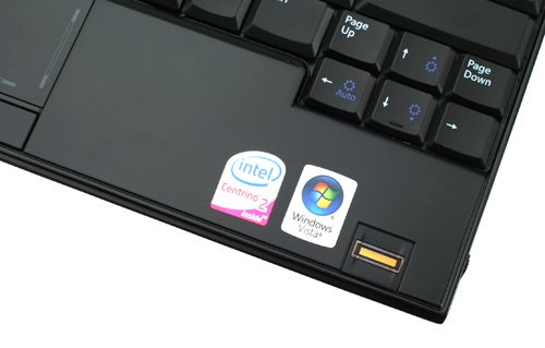 Close-up of Dell Latitude E4200 laptop keyboard and stickers