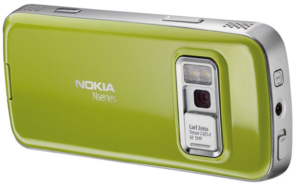 Green Nokia N79 mobile phone with camera lens.