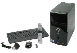 Dell Studio XPS desktop PC with accessories.