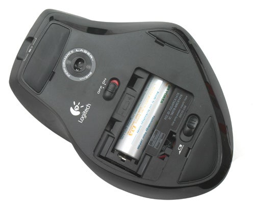 Logitech Cordless Desktop Wave Pro mouse rear view with battery compartment open.