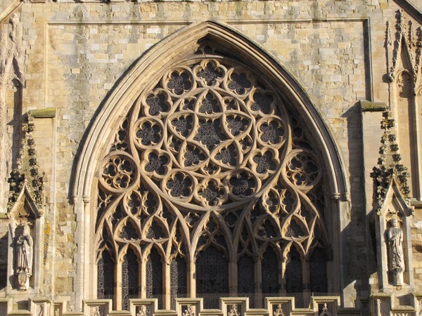 Detailed gothic church window lattice design.