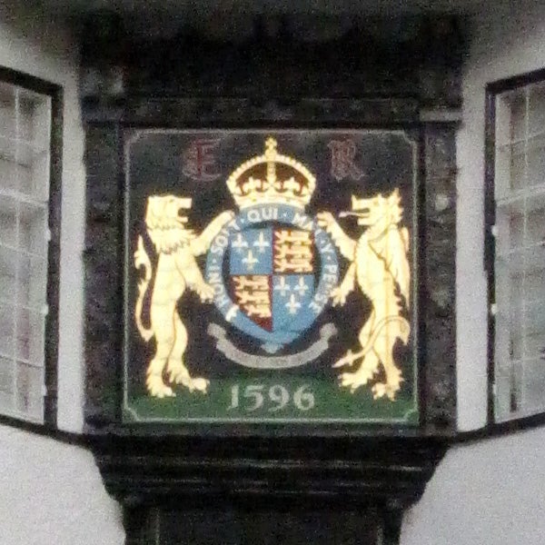 Coat of arms plaque with the date 1596.