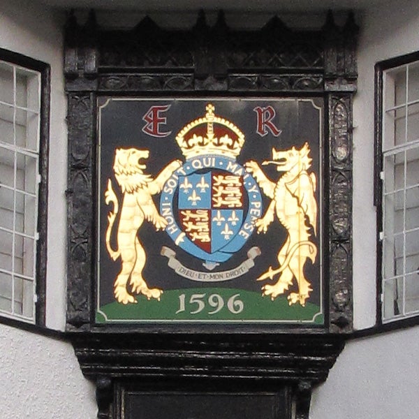 Coat of arms on building facade with date 1596.