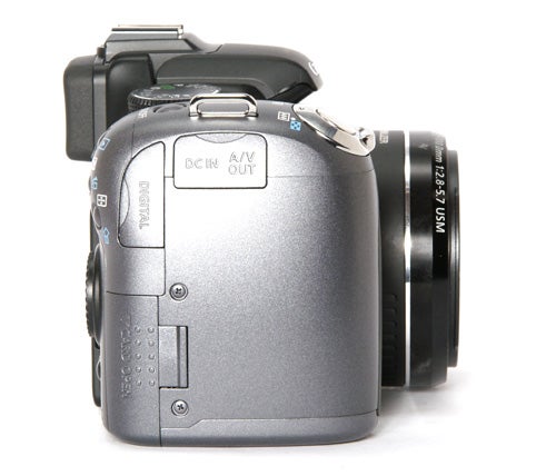 Canon PowerShot SX10 IS digital camera side view.