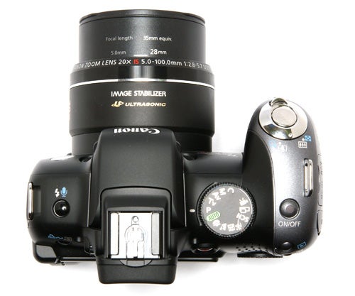 Canon PowerShot SX10 IS digital camera on white background