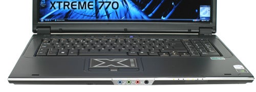 Rock Xtreme 780 gaming notebook with screen displaying logo.