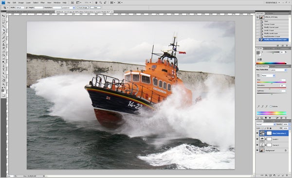Screenshot of Adobe Photoshop CS4 editing interface with boat photo.
