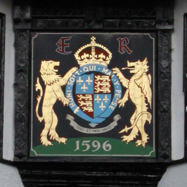 Coat of arms plaque with lions and crown from 1596.
