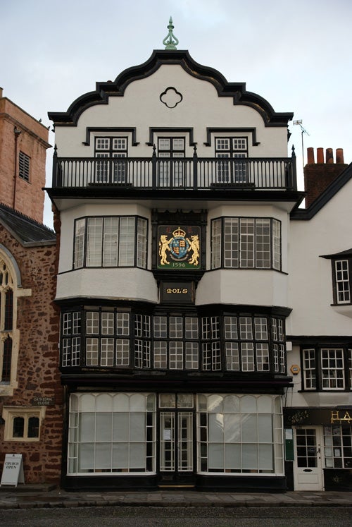 Traditional black and white Tudor building façade.