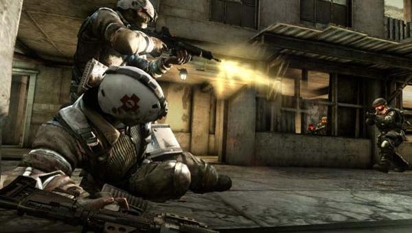 Screenshot of gameplay from Killzone 2 with soldiers firing weapons.