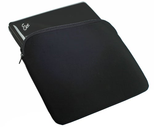 Asus Eee PC 1000HE in a protective black sleeve.