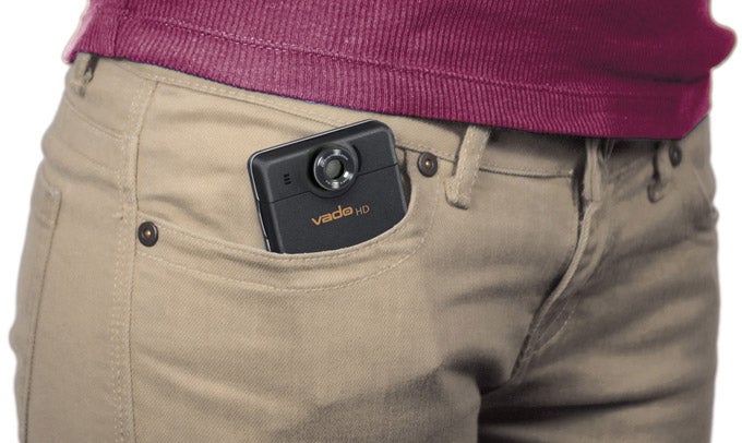 Creative Vado HD pocket video camera in beige pants pocket.