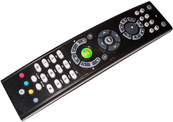 Remote control with buttons and directional pad for multimedia server.
