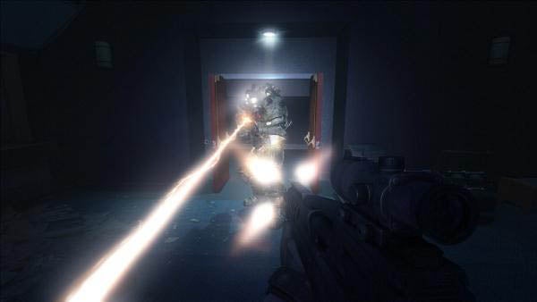 First-person shooter gameplay from F.E.A.R. 2: Project Origin.